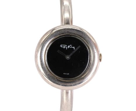 A ladies' sterling silver mechanical bangle watch by Roy King, c.1975,  with a circular case, 31mm diameter. A black dial wit