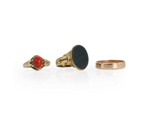 A group of three rings, comprising:a gold wedding ring,with a flat profile, inscribed 'Dauiavos Π 6-5-81' to the inside, test