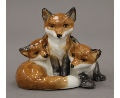 A Royal Worcester 3131 model of fox cubs. 5.5 cm high.