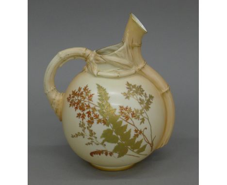 A Royal Worcester blush ivory ewer. 21 cm high.