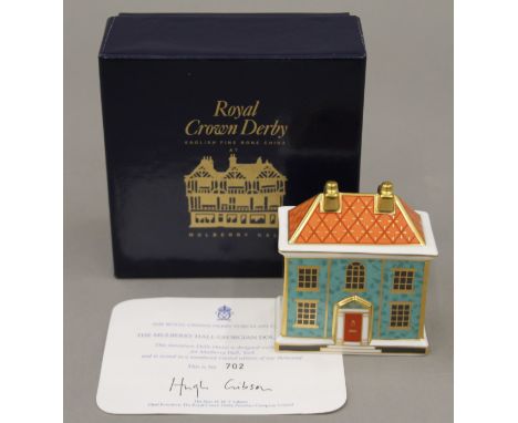 A boxed Royal Crown Derby Georgian Dolls House paperweight.