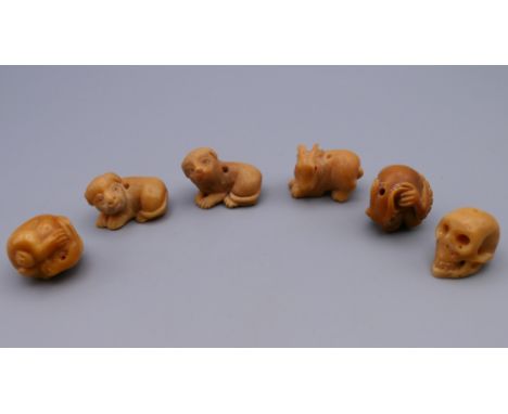 Six small carved netsuke. Hare 2.5 cm long.