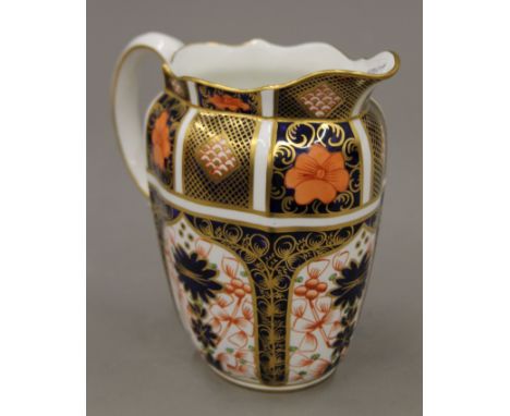 A Royal Crown Derby jug. 16 cm high.