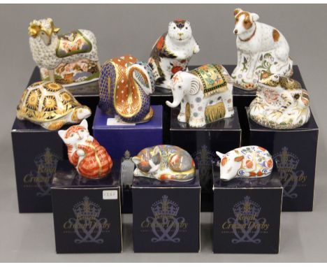 Ten boxed Royal Crown Derby paperweights.