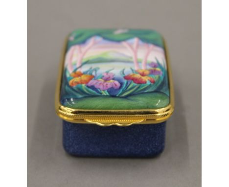 A boxed Moorcroft enamel Elysium box. 4 cm wide.