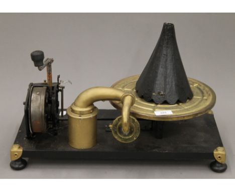 An unusual gramophone record player. 48.5 cm long.