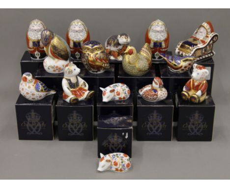 A collection of fifteen boxed Royal Crown Derby paperweights.