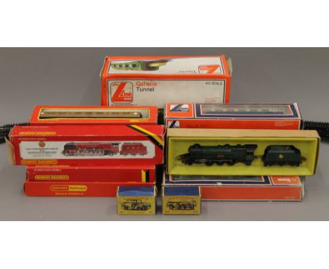 A quantity of various Hornby, Lima and Airfix 00 gauge railway engines, carriages and other accessories.