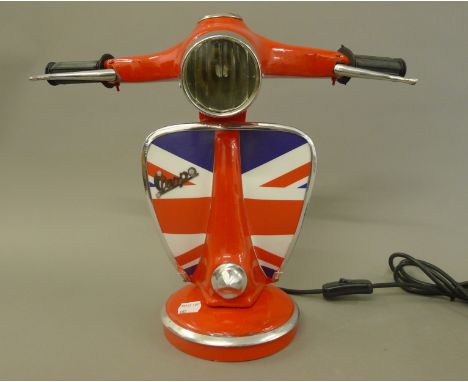 A red Vespa lamp. 33.5 cm high.