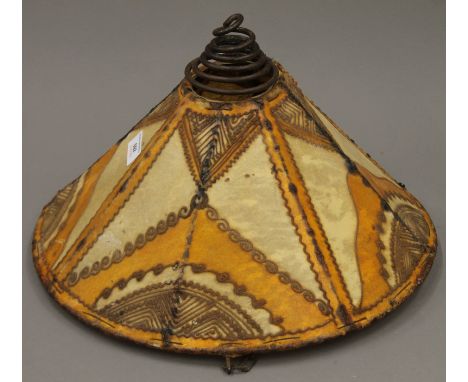 A hide lamp shade. 40 cm diameter.