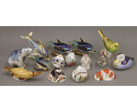 A collection of Royal Crown Derby paperweights.