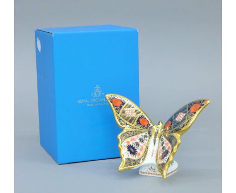 A boxed Royal Crown Derby Imari Butterfly paperweight.