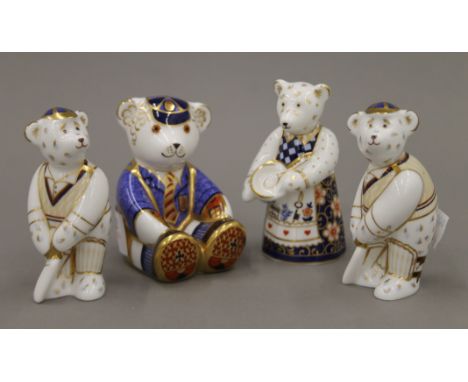 Four Royal Crown Derby teddy bear paperweights.