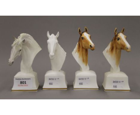 Four Royal Worcester horse busts. The largest 13 cm high.