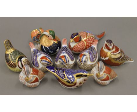 A collection of Royal Crown Derby bird form paperweights.