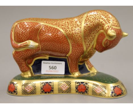 A Royal Crown Derby Harrods Bull paperweight. 19 cm long.