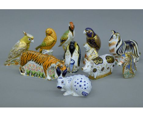 A collection of Royal Crown Derby paperweights.