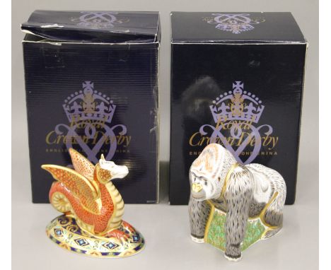 Two boxed Royal Crown Derby paperweights, Mountain Gorilla and The Wessex Wyvern.