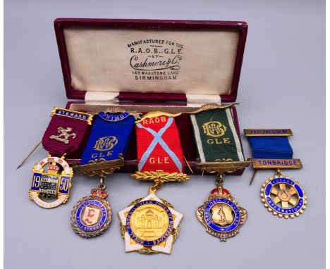 Three ROAB medals, an RMBI Masonic Steward 1950 medal and a Past President Tonbridge Rotary International medal, together wit