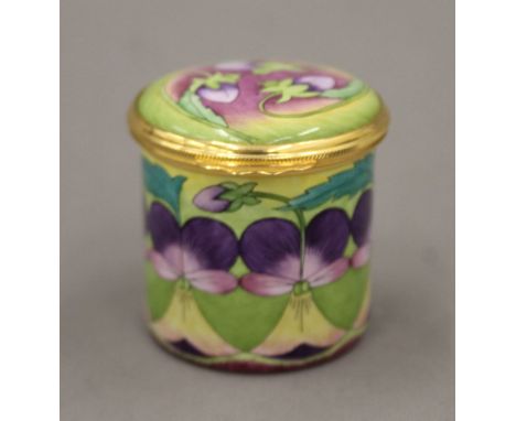 A boxed Moorcroft enamel Heartsease box. 4.25 cm diameter.
