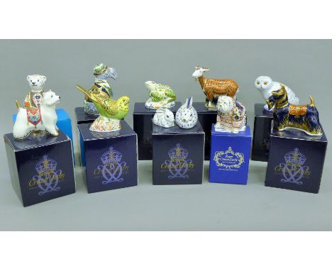 A collection of ten boxed Royal Crown Derby paperweights.