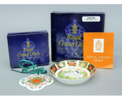 A boxed Royal Crown Derby rabbit pin tray and a boxed Christmas Wreath. 