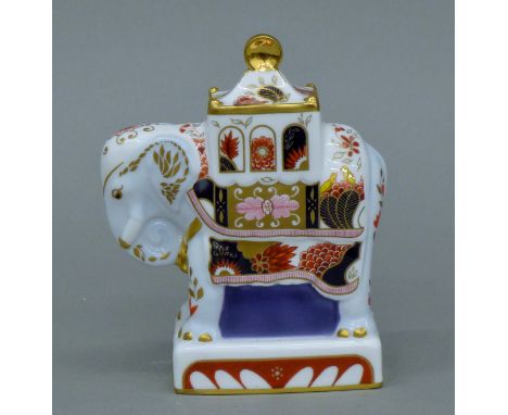 A Royal Worcester Nelson Elephant. 12 cm high.