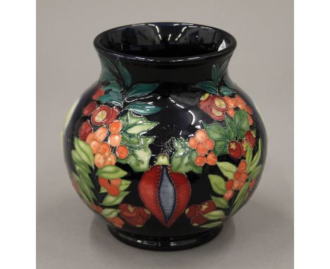 A Moorcroft Guiding Light vase, numbered 41/50. 14 cm high.
