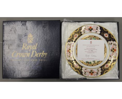 A boxed Royal Crown Derby 1997 Christmas plate. 