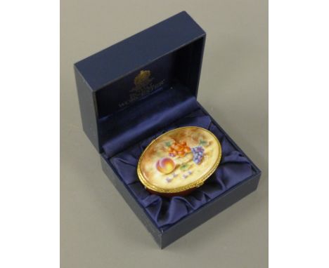 A boxed Royal Worcester fruit study porcelain patch box. 