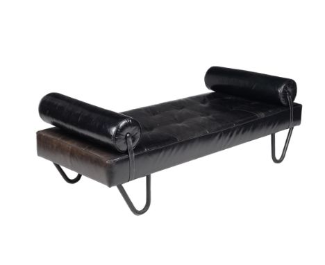 Anonymous, a pair of daybeds, circa 1940, black leather and enamelled steel, with twin bolster cushions, 65.5cm high, 192cm w