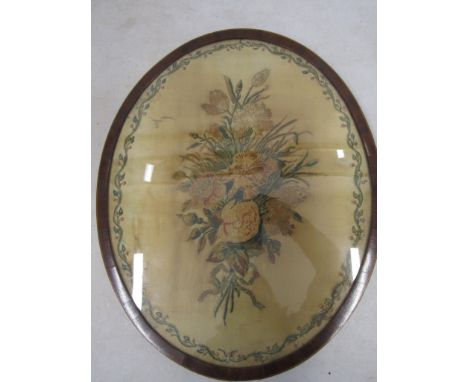 An Antique framed embroidery, some tears and fading 45x37cm