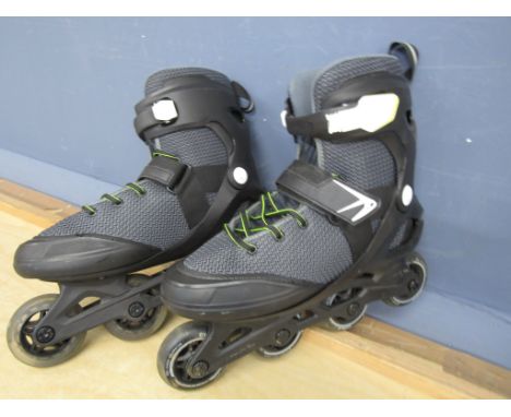 A pair decathlon roller blades size 6