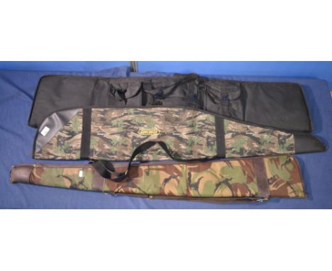 Three gun slips, one army camouflage, one real tree, one black 