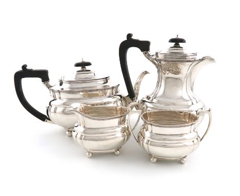 A matched four-piece silver tea set, by Harrison Brothers &amp; Howson, Sheffield 1930, 1933, 1935, rounded rectangular form,