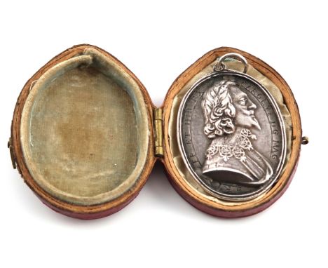 Charles I, a silver Royalist badge, by Thomas Rawlins, oval form, bust of the King right, with the inscription 'CARLOVS . DG 