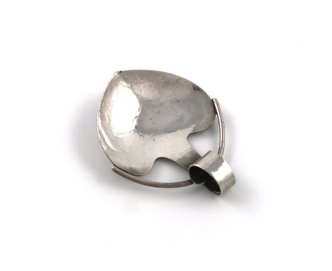 By A E Jones, an Edwardian Arts and Crafts silver caddy spoon, Birmingham 1908, spot-hammered bowl, the scroll handle with a 