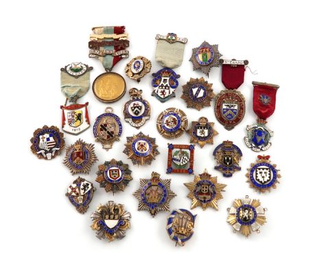 A collection of twenty-five silver, silver-gilt and enamel Masonic badges, various dates and makers, including the Masonic In