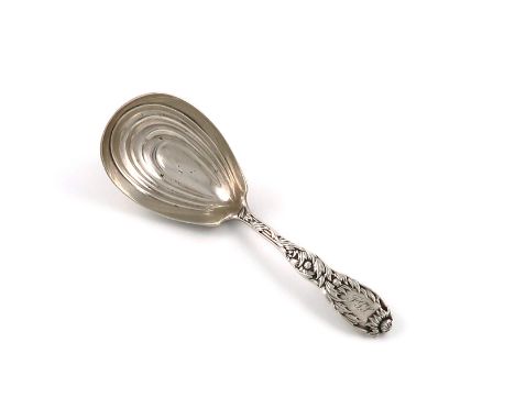 A late 19th century American Chrysanthemum pattern silver caddy spoon, by Tiffany and Co., markd  Pat. 1880 M, oblong shaped 