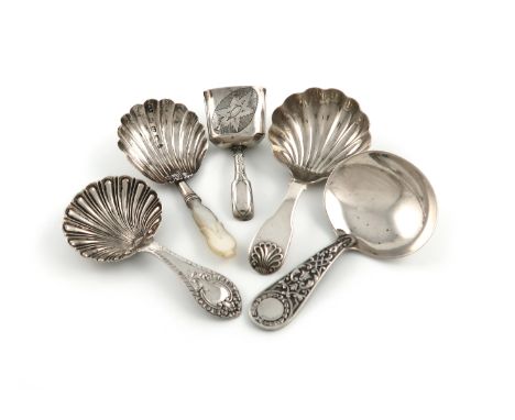 A collection of five antique silver caddy spoons, comprising: one Victorian caddy spoon by George Unite, Birmingham 1860, she