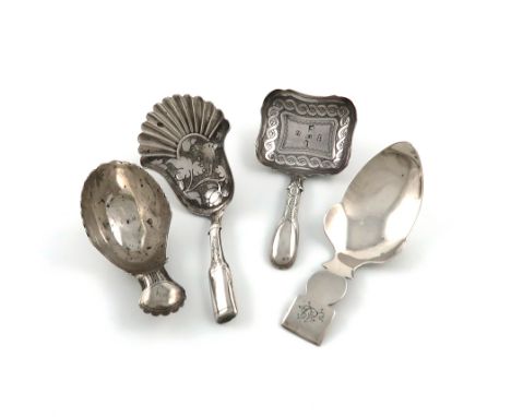 A collection of four antique silver caddy spoons, comprising: a Victorian one by Taylor &amp; Perry, Birmingham 1847, a shape