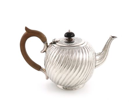 A Victorian silver teapot, by Army &amp; Navy Cooperative Society Ltd (Frederick Bradford Macrea), London 1890, swirl fluted 