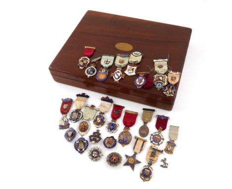A collection of twenty-five silver, silver-gilt and enamel Masonic badges, various dates and makers, including the Mark Benev