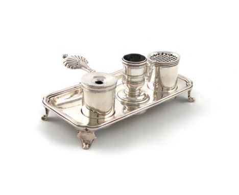 A small 18th century silver inkstand, unmarked, rectangular form, fluted carrying handle, with a pen tray and with an inkwell