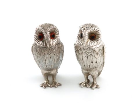 A matched pair of modern novelty silver owl salt and pepper pots, one by R. Comyns, London 1978, the other by Mappin and Webb