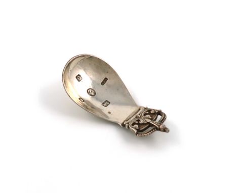 A commemorative Elizabeth II coronation silver caddy spoon, by Robert Edgar Stone, London 1953, spot hammered decoration, the