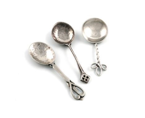 A collection of three silver spoons, comprising: two teaspoons by Winifred King &amp; Co, Birmingham 1924 and 1925, oval bowl