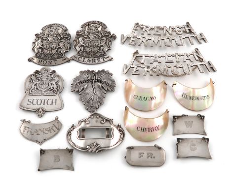 A mixed lot of wine labels, comprising silver ones: a modern armorial pair, incised 'CLARET' and 'PORT', and one incised 'SCO