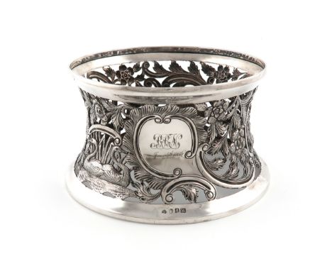 An Irish silver dish ring, by Wakeley &amp; Wheeler, Dublin 1915, circular tapering form, pierced and embossed with animals, 