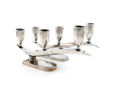 A pair of modern Mexican three-light candelabra, by RV or RN script, tapering form, with three plain capitals, on a fluted st